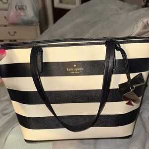Kate Spade Black and Cream striped tote with silver spade charm clean no call